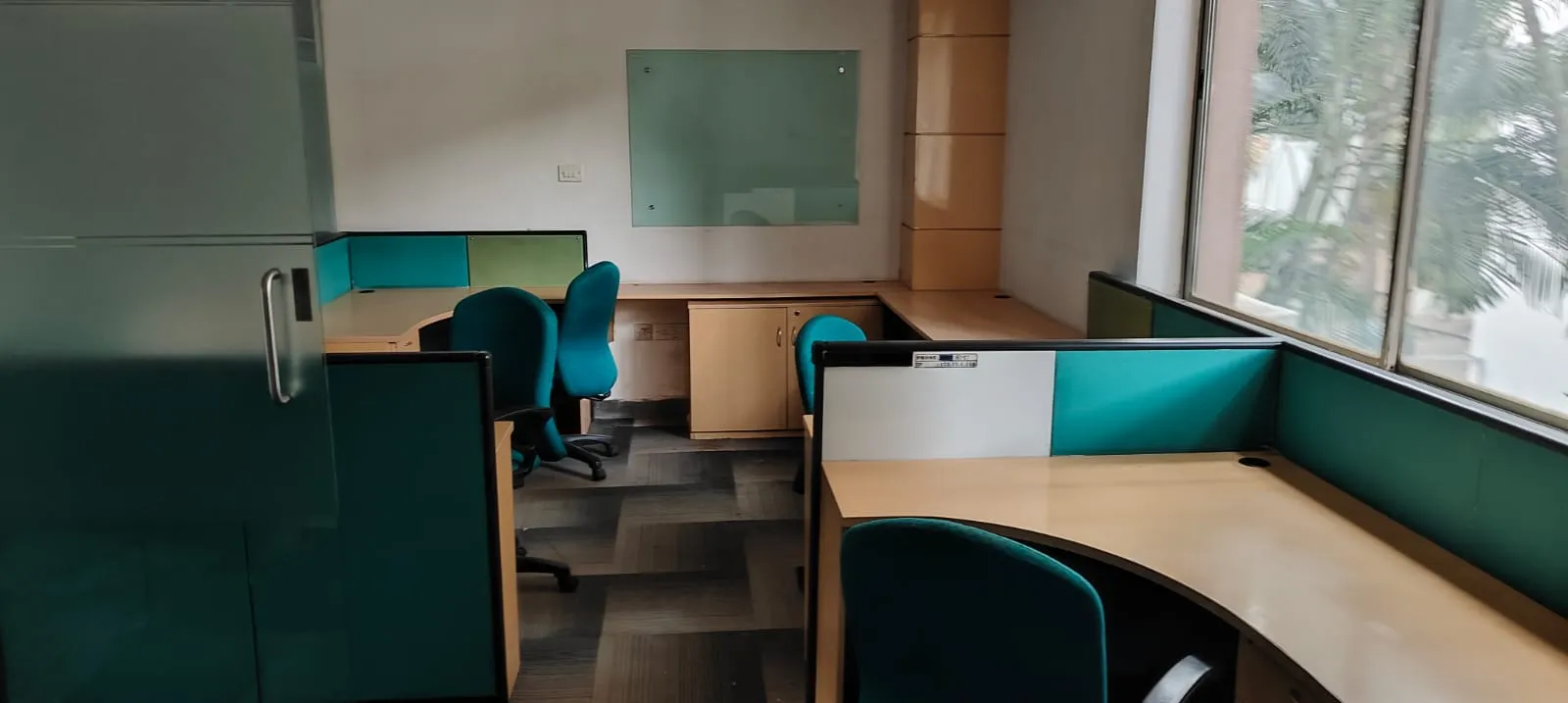 Drywall and partition panels unbolted safely to handle commercial office dismantling Guindy steps.