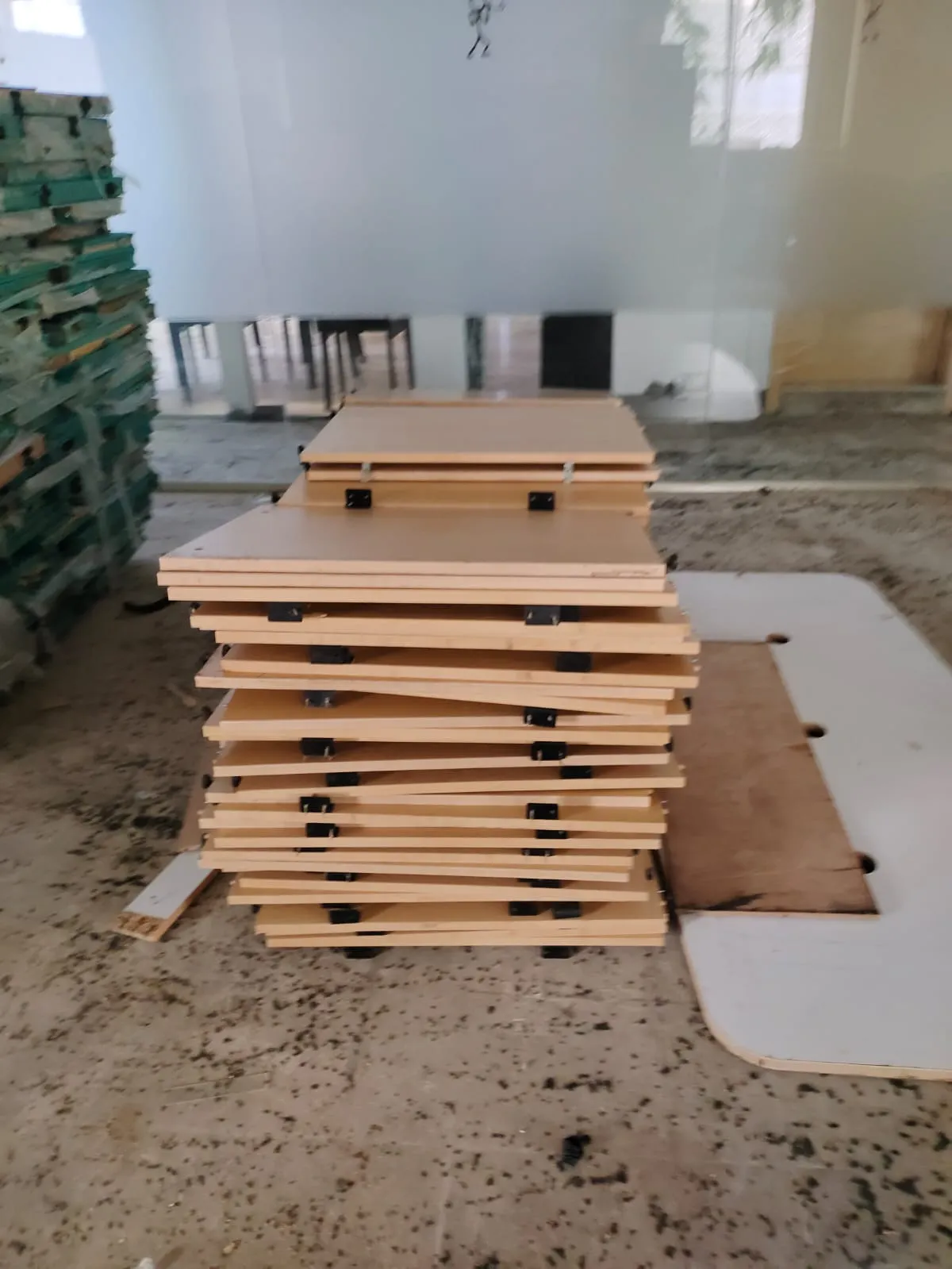 Disassembled corporate workstations flat-packed carefully during an office furniture dismantling Guindy assignment.